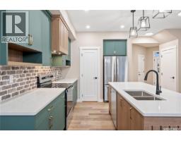Laundry room - 214 Yuel Lane, Saskatoon, SK S7W1N7 Photo 11