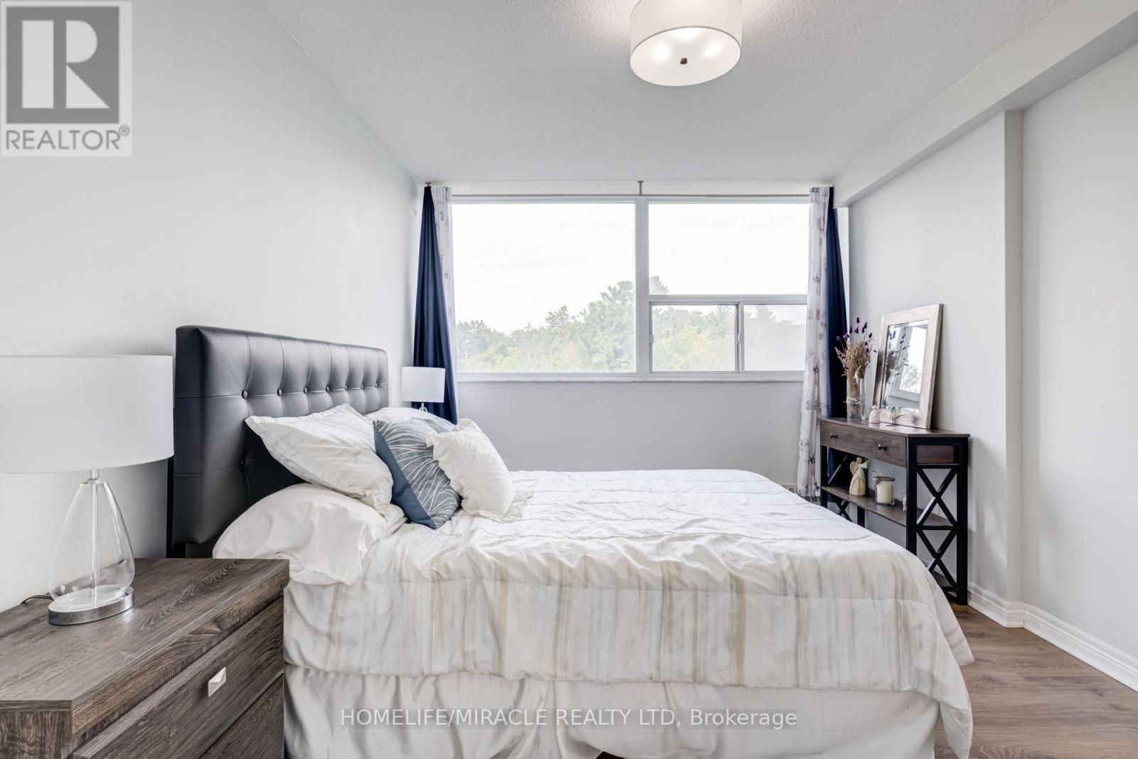 #302 3501 GLEN ERIN DRIVE - 27