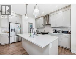 Laundry room - 138 Silver Spruce Grove Sw, Calgary, AB T2X5M2 Photo 15