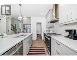Family room - 138 Silver Spruce Grove Sw, Calgary, AB T2X5M2 Photo 17