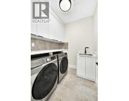 Laundry room - 2049 Waterbury Road, Chestermere, AB T1X3A9 Photo 16