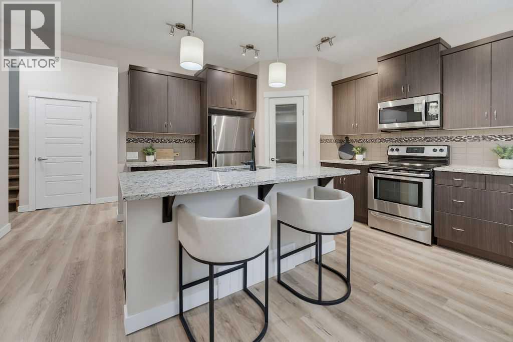145 Sunset Manor, Sunset Ridge, Cochrane photo 3