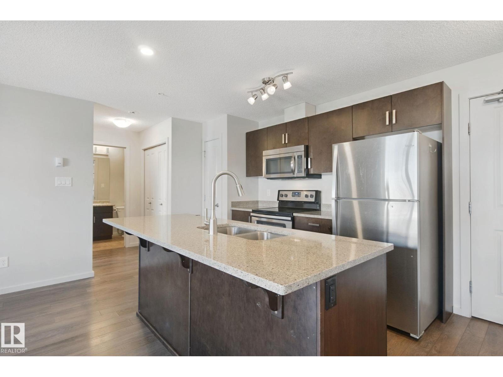#330 390 Windermere RD NW - 3