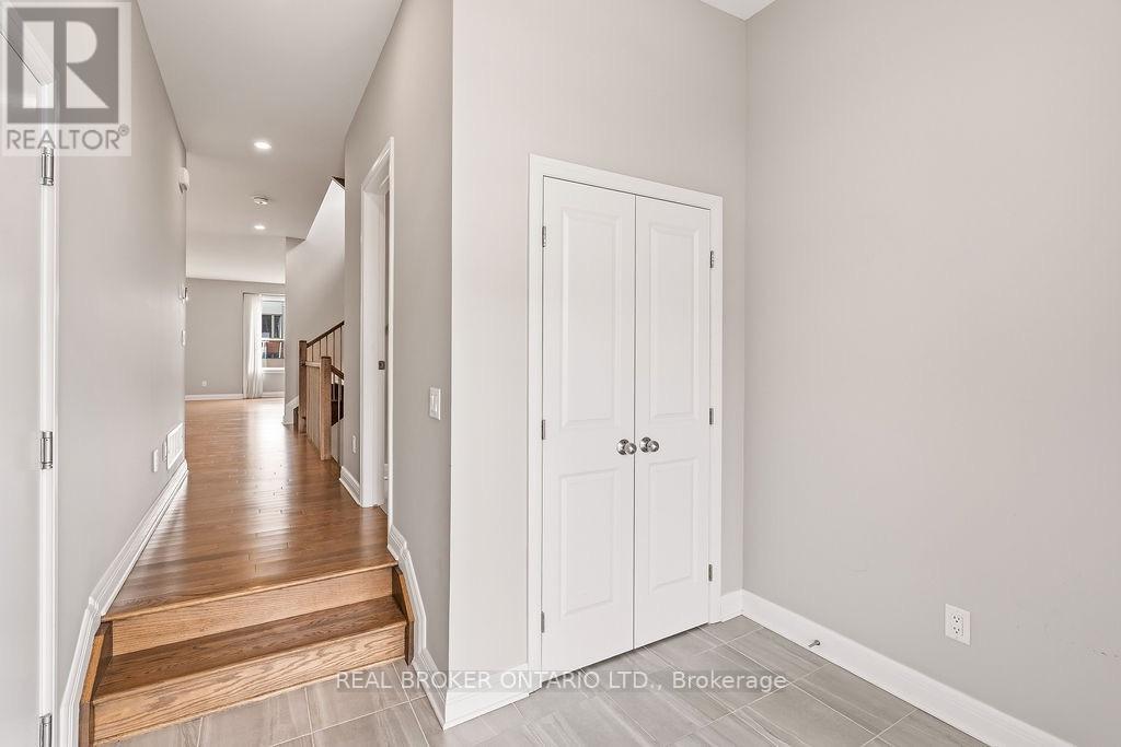 Foyer & Closet with Garage Door Access