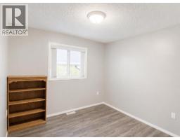 Bedroom - 121a & 121b, 71322 Range Road 262, Ridgevalley, AB T0H0Y0 Photo 8