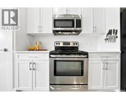 Laundry room - 636 Meadows Boulevard, Saskatoon, SK S7V0M5 Photo 10