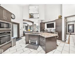 Laundry room - #101 54302 Rge Road 250, Rural Sturgeon County, AB T8T0C9 Photo 12