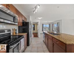 #114 12660 142 Av Nw, Edmonton, AB T5X0J5 Photo 6
