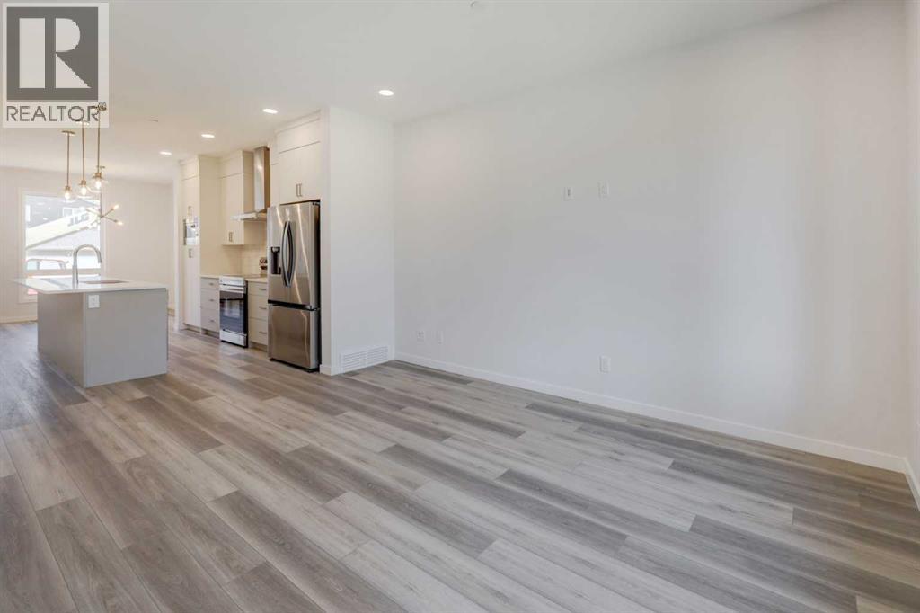 99 Herron Walk NE, Livingston, Calgary photo 3