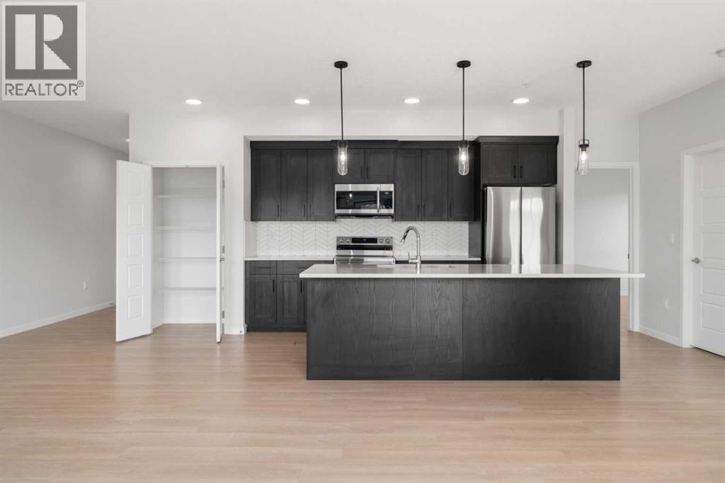 #2310 42 Cranbrook Gardens SE - 7