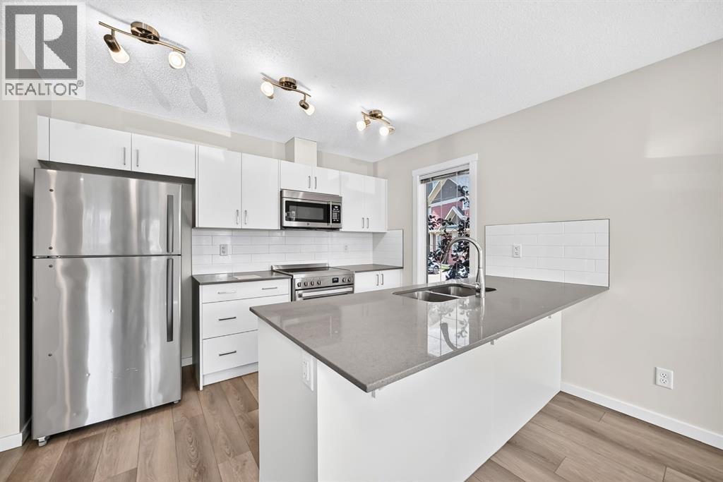 428 Cranbrook Square SE, Cranston, Calgary photo 4