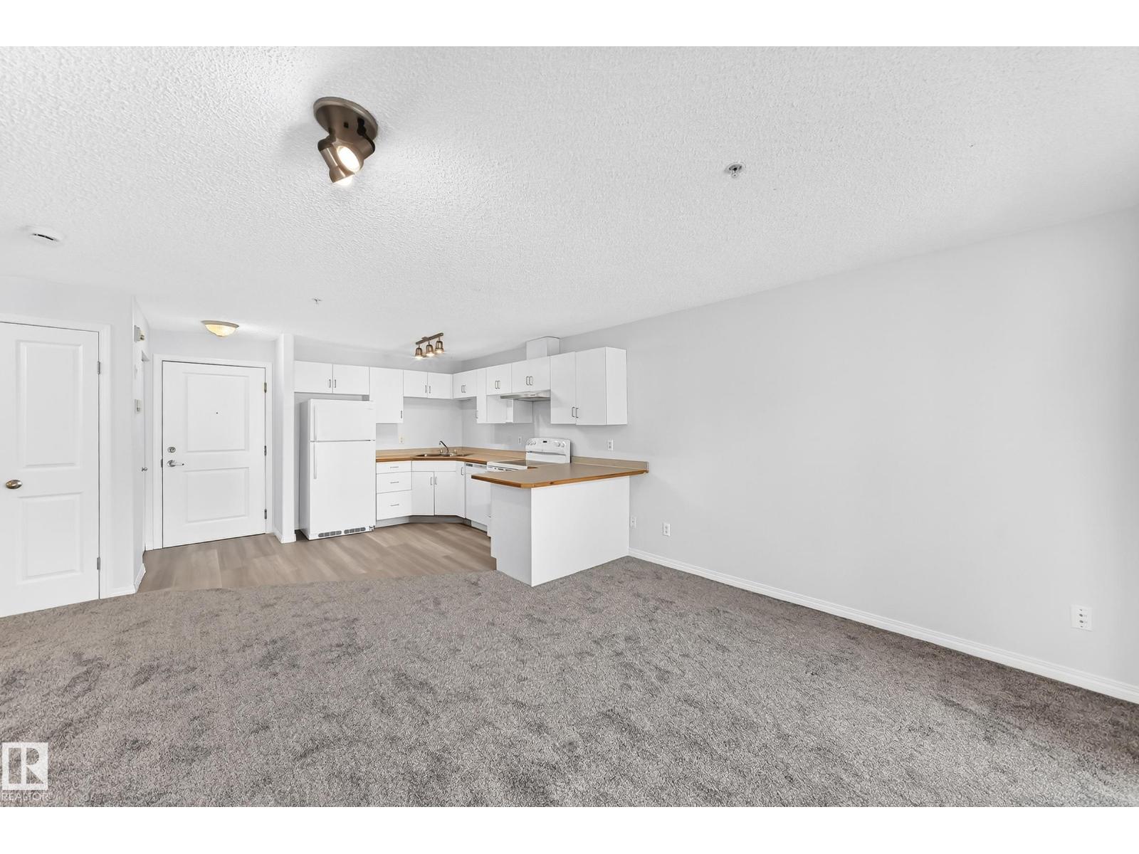 #218 10535 122 ST NW - 18