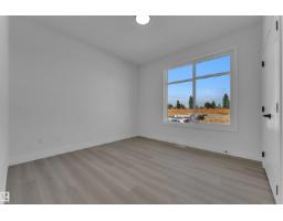 Bedroom 2 - 213 Falcon Crescent, Leduc, AB T9E1V2 Photo 6