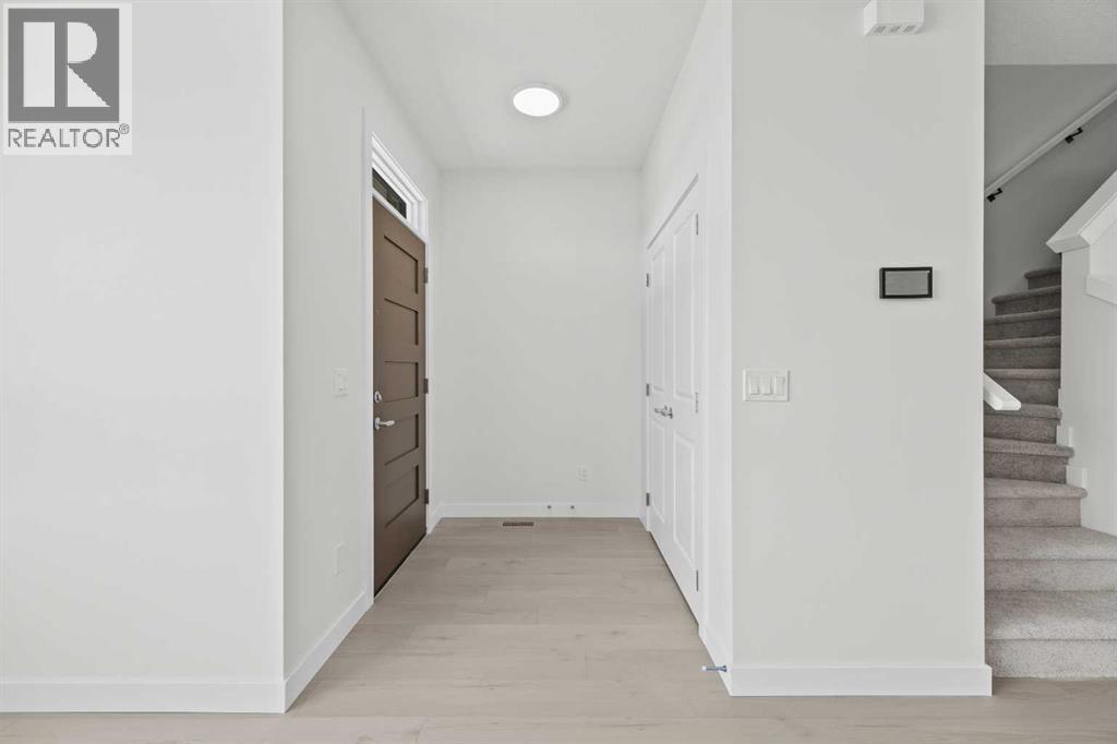 21531 Sheriff King Street SW, Pine Creek, Calgary photo 3