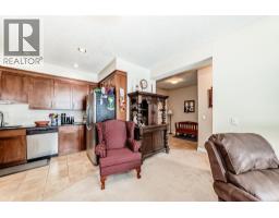Living room - 107, 1005a Westmount Drive, Strathmore, AB T1P0C3 Photo 7
