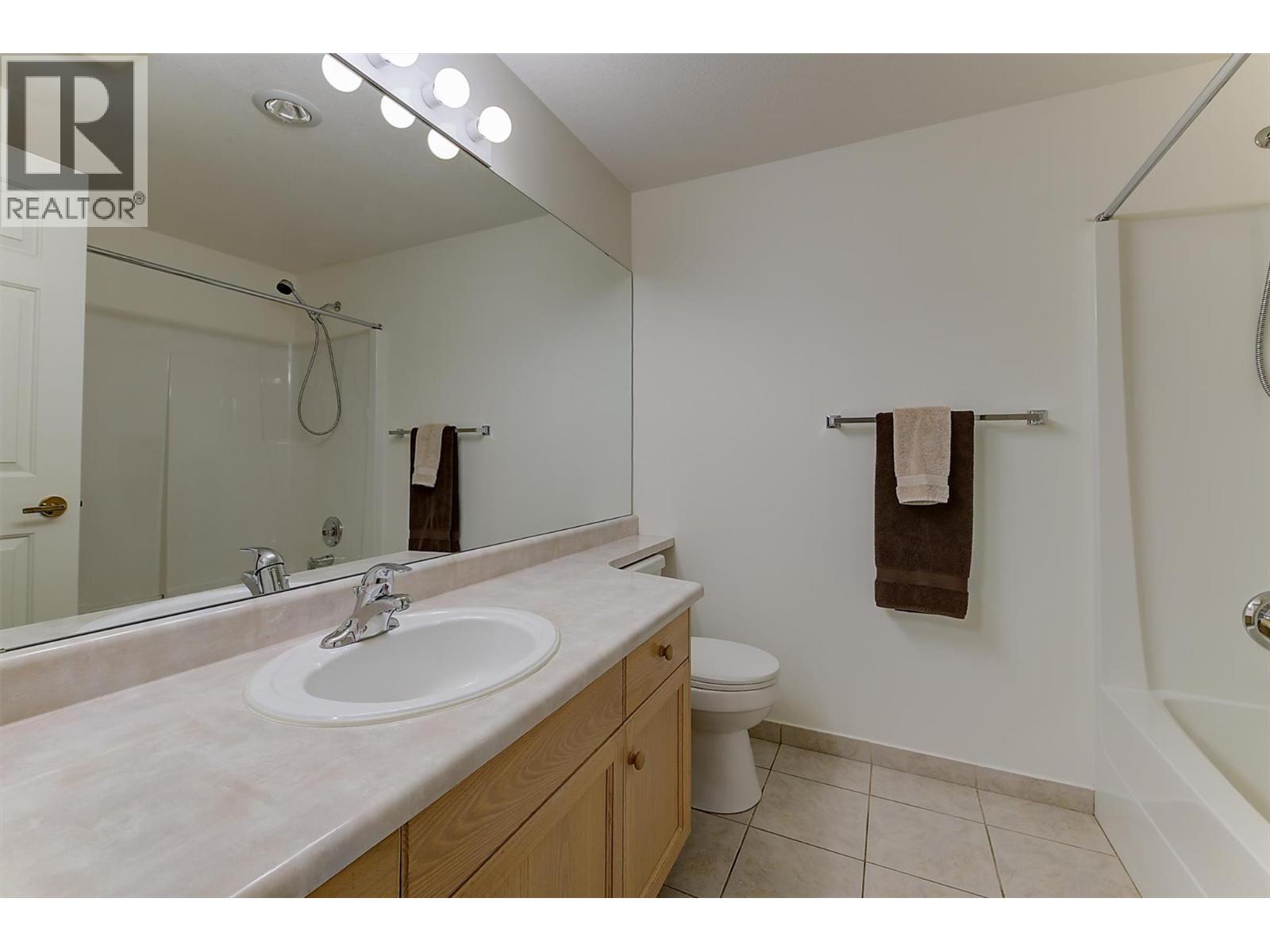 #101 3335 Richter Street - 28