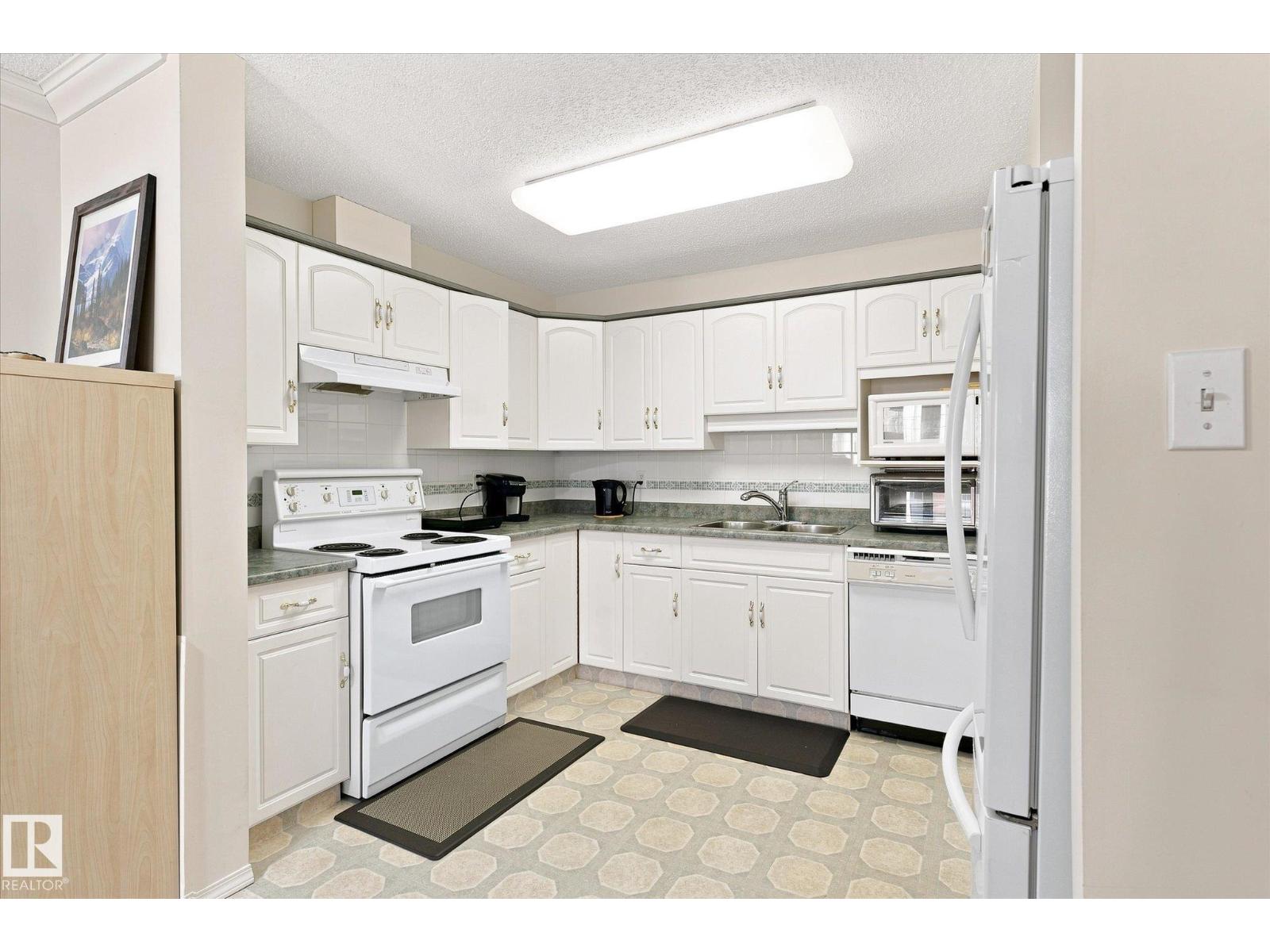 #309 13450 114 AV NW - 11