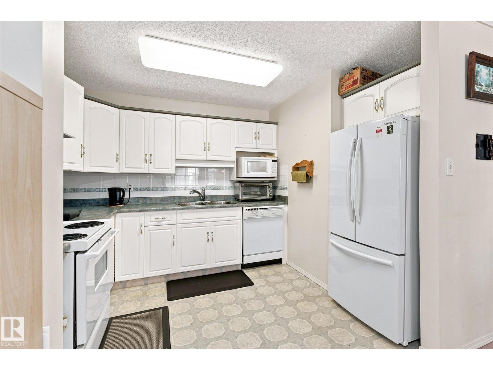 #309 13450 114 AV NW - Image 12