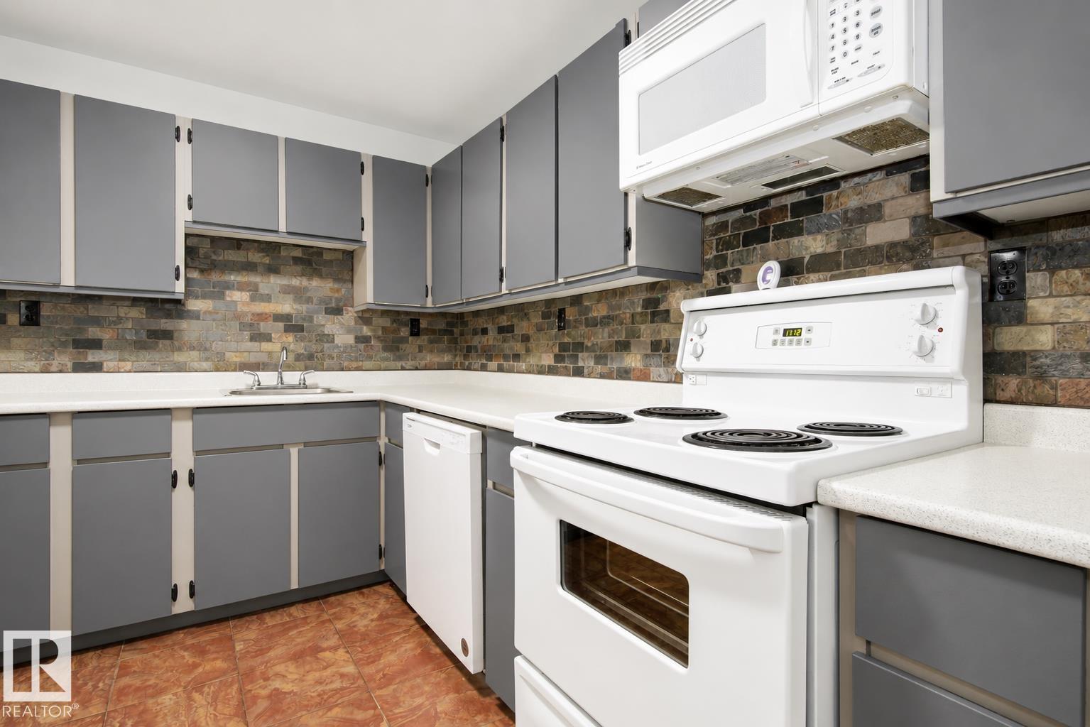 #203 2624 MILL WOODS RD E NW - 18