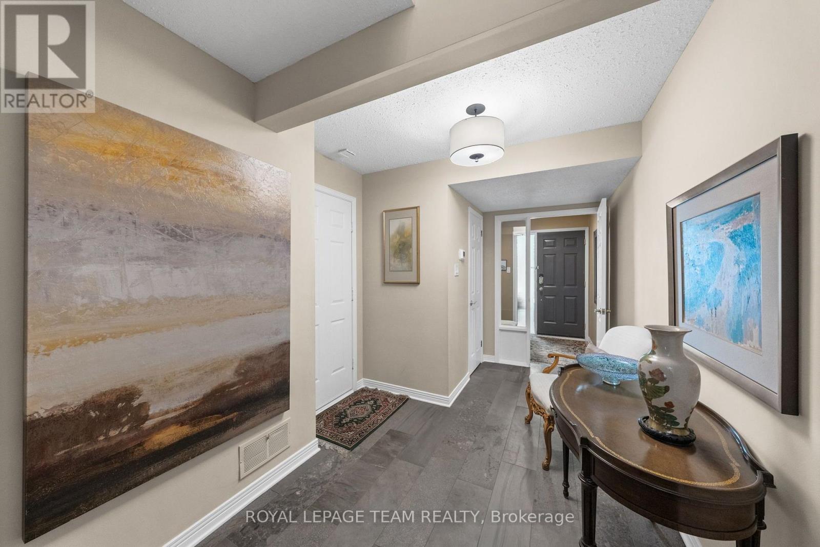 Foyer with powder room and coat closet