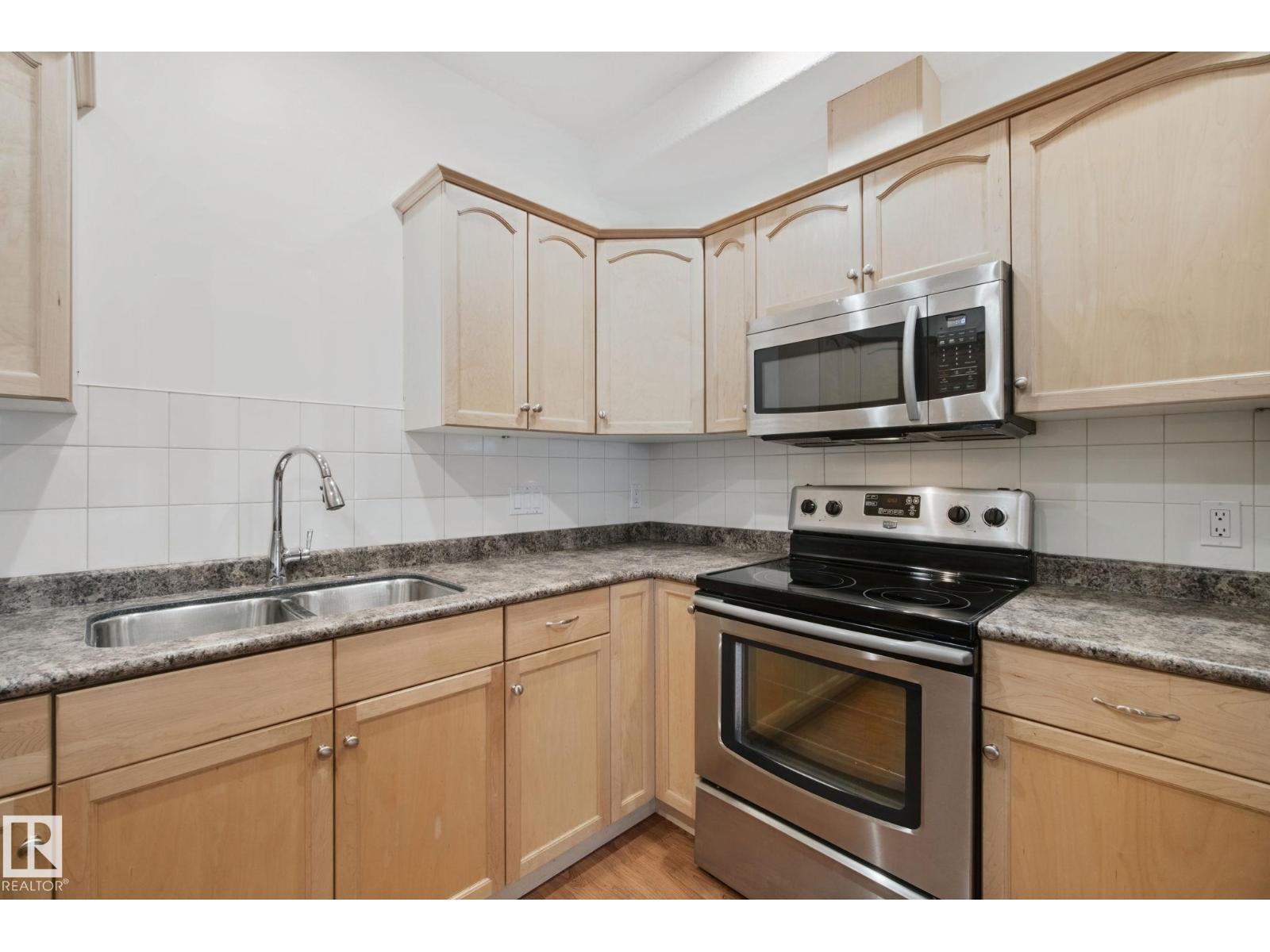 #203 10178 117 ST NW - 8