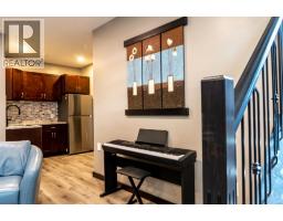 216 Cottageclub Crescent, Rural Rocky View County, AB T4C1B1 Photo 17