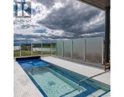 216 Cottageclub Crescent, Rural Rocky View County, AB T4C1B1 Photo 24