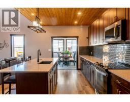 216 Cottageclub Crescent, Rural Rocky View County, AB T4C1B1 Photo 9