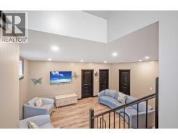 216 Cottageclub Crescent, Rural Rocky View County, AB T4C1B1 Photo 16