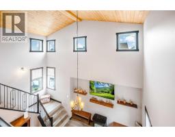 216 Cottageclub Crescent, Rural Rocky View County, AB T4C1B1 Photo 11