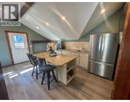 216 Cottageclub Crescent, Rural Rocky View County, AB T4C1B1 Photo 20
