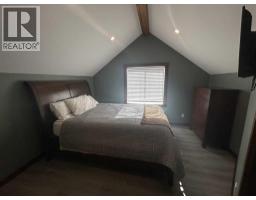 216 Cottageclub Crescent, Rural Rocky View County, AB T4C1B1 Photo 22