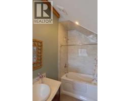 216 Cottageclub Crescent, Rural Rocky View County, AB T4C1B1 Photo 21