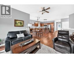 Bedroom - 84 River Heights View, Cochrane, AB T4C0E6 Photo 9