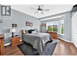 84 River Heights View, Cochrane, AB T4C0E6 Photo 15