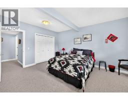 84 River Heights View, Cochrane, AB T4C0E6 Photo 22