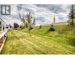 84 River Heights View, Cochrane, AB T4C0E6 Photo 26