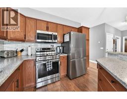 Living room - 84 River Heights View, Cochrane, AB T4C0E6 Photo 6