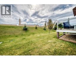 84 River Heights View, Cochrane, AB T4C0E6 Photo 25