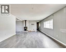 Living room - 144 Greenfield Place, Fort Mcmurray, AB T9H2M1 Photo 6