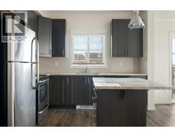 Living room - 1411, 99 Copperstone Park Se, Calgary, AB T2Z5C9 Photo 6