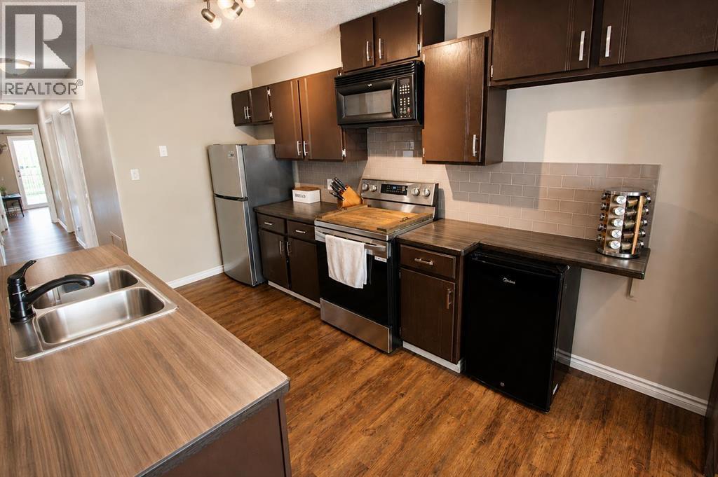 Listing photo – 63 MacKenzie Crescent, Red Deer