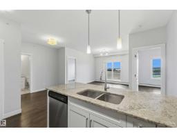 Laundry room - #411 3670 139 Av Nw, Edmonton, AB T5Y3N5 Photo 6