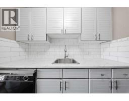 Laundry room - 202, 718 12 Avenue Sw, Calgary, AB T2R0H7 Photo 6