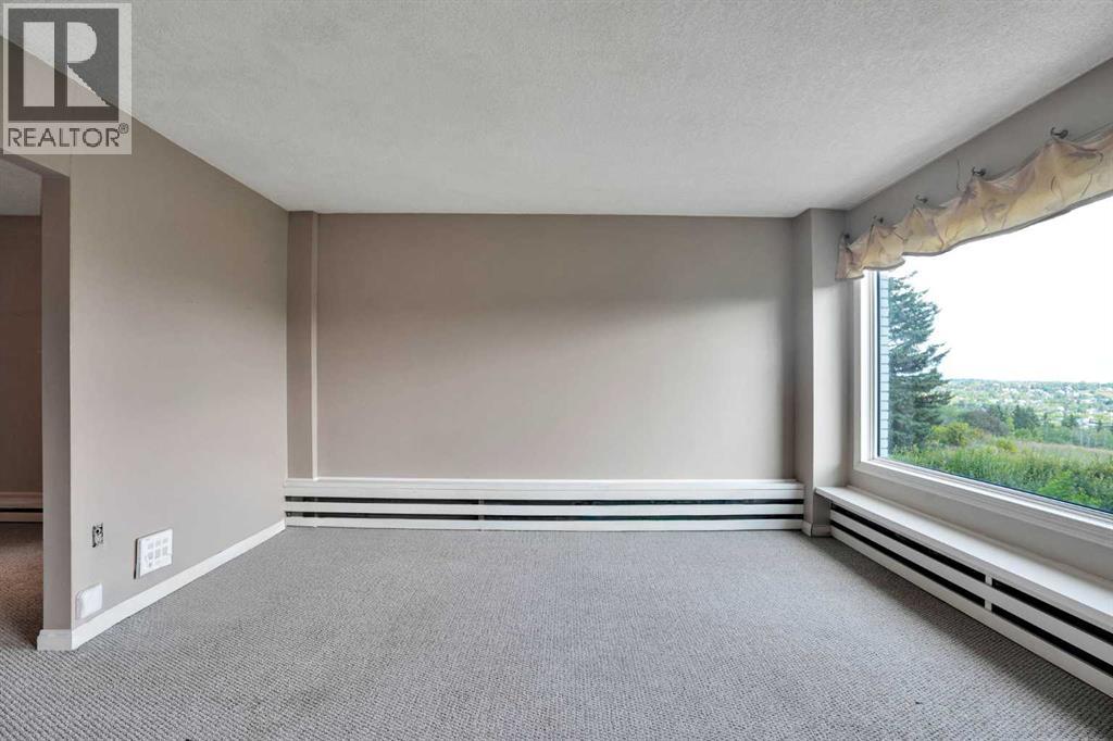 #103 520 Cedar Crescent SW - 15