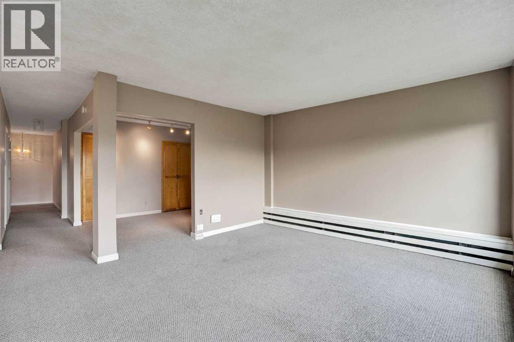 #103 520 Cedar Crescent SW - 16