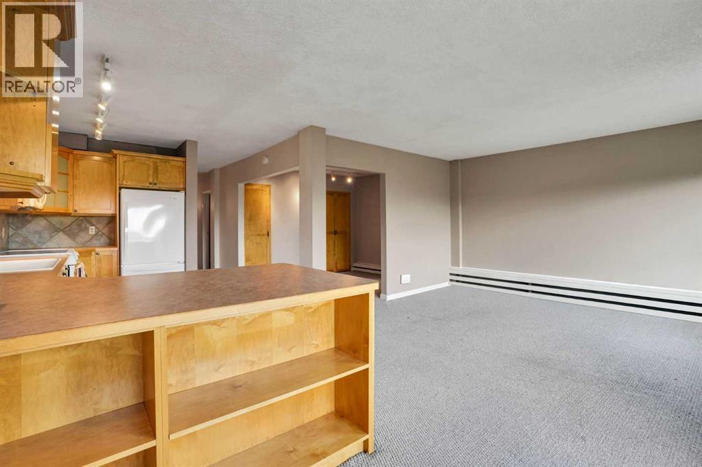 #103 520 Cedar Crescent SW - 21