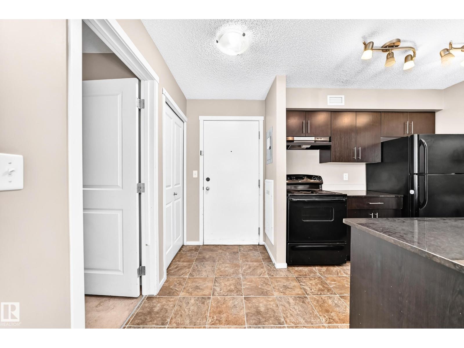 #218 5810 MULLEN PL NW - 5