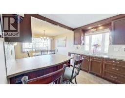 Family room - 5803 Dalgleish Road Nw, Calgary, AB T3A1K4 Photo 9