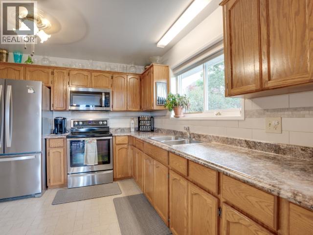 6886 HARVIE AVE - Image 12
